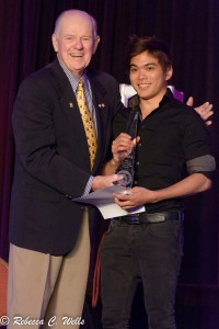 North American FISM Close-Up Champion, Shin Lim, receives his award from Brad Jacobs at the Combined Convention Awards Ceremony